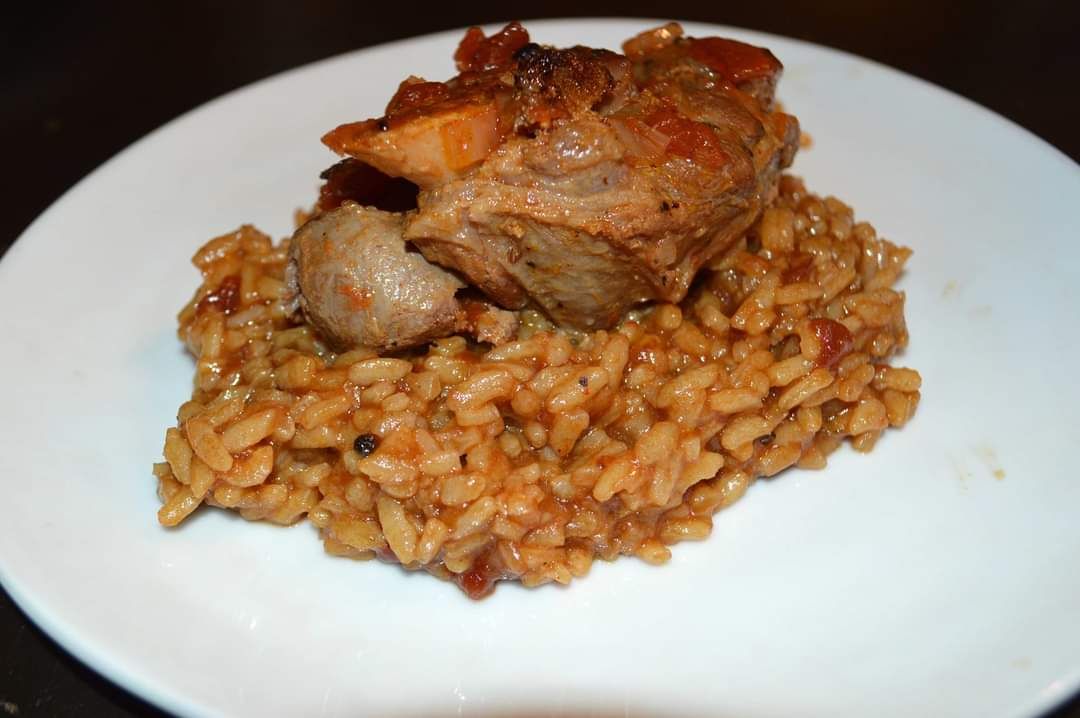 Whiskey braised wild boar shanks over duck fat risotto